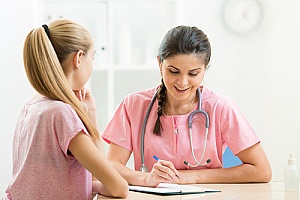 a woman receiving help managing menstrual disorders