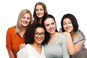 Five women posing against white background