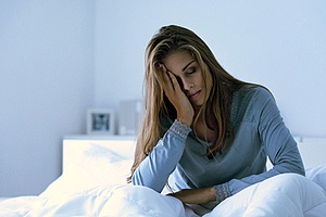 a woman suffering from fatigue is a common symptom of endometriosis
