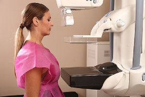 Woman taking a mammogram x-ray test.