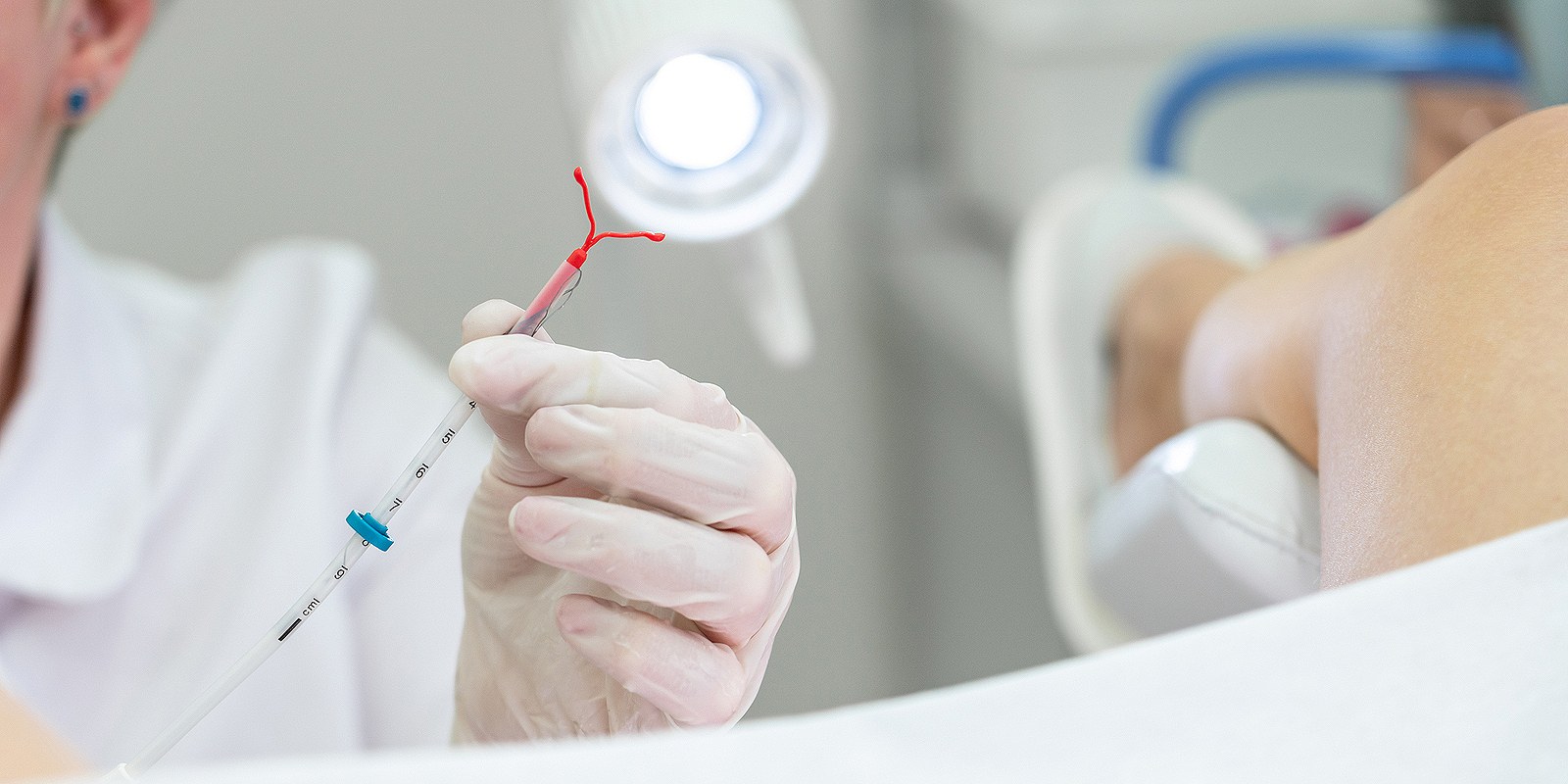 A Gynecologist is preparing to place an IUD on a patient