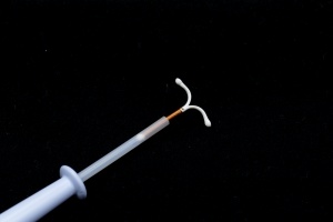 a IUD myth breaking by seeing it behind black background