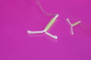 two IUD with pink back-round 