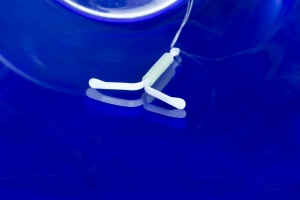 a iud with blue background
