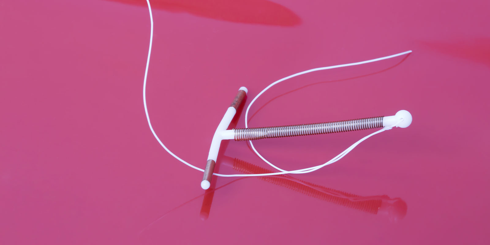 a IUD on a table when people wondering How Long Does It Take To Get Pregnant After IUD Removal