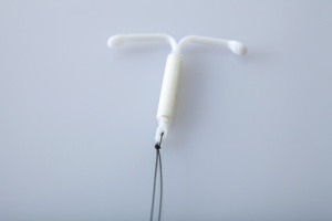 a IUD close up on white background