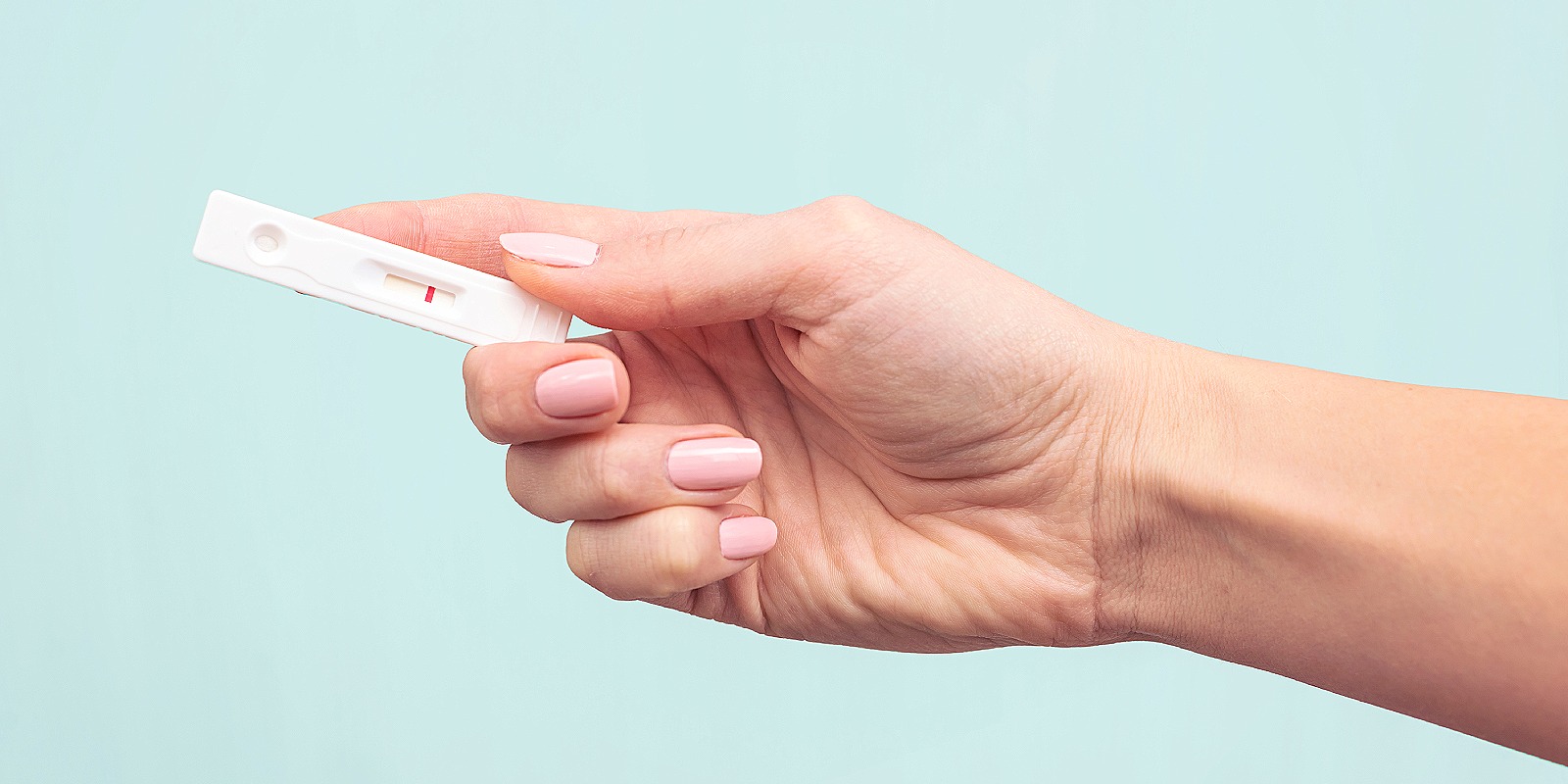 Picture of negative pregnancy test. Nexplanon implant provides effective contraception