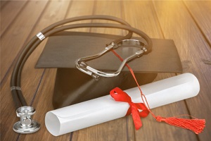 Nurse Practitioner degree with red ribbon and stethoscope