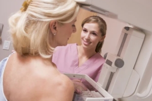 nurse preparing women for mammogram for her Breast Care