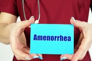 doctor holding amenorrhea written paper