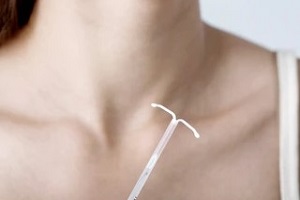 iud insertion device with women in background