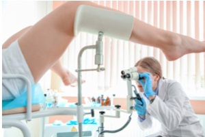 female gynecologist working with patient in clinic