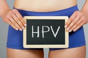 women holding hpv written board