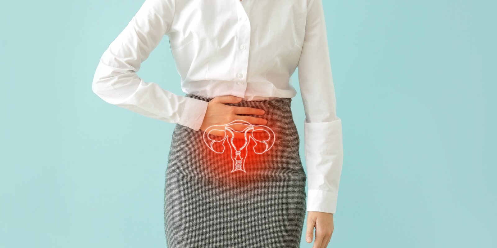 businesswoman suffering from abdominal pain