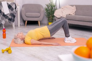 A woman doing kegel exercise at her home