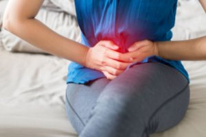 A woman is experiencing extreme pelvic floor muscles pain