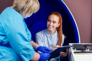 a young woman is consulting a gynecologist