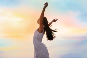 A woman enjoying the summer evening