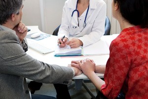 A couple consulting a doctor