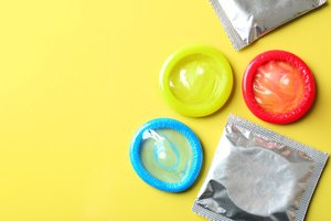 Open and wrapped condoms
