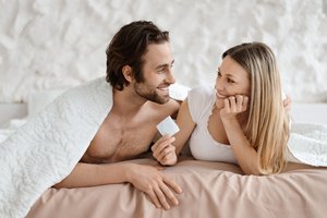 A couple using condoms to prevent STDs