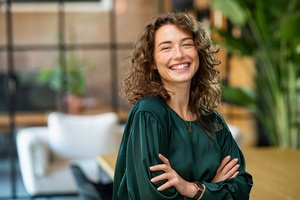 A woman smiling