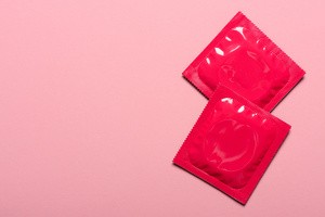 Pink male condoms