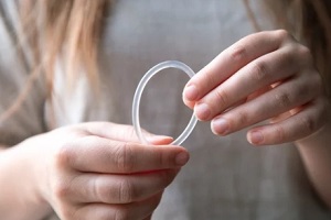 North Carolina women holding vaginal ring in hands