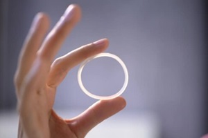 NC women hand holding vaginal ring