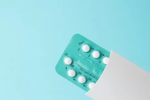pack of oral hormonal contraceptive pills with instructions