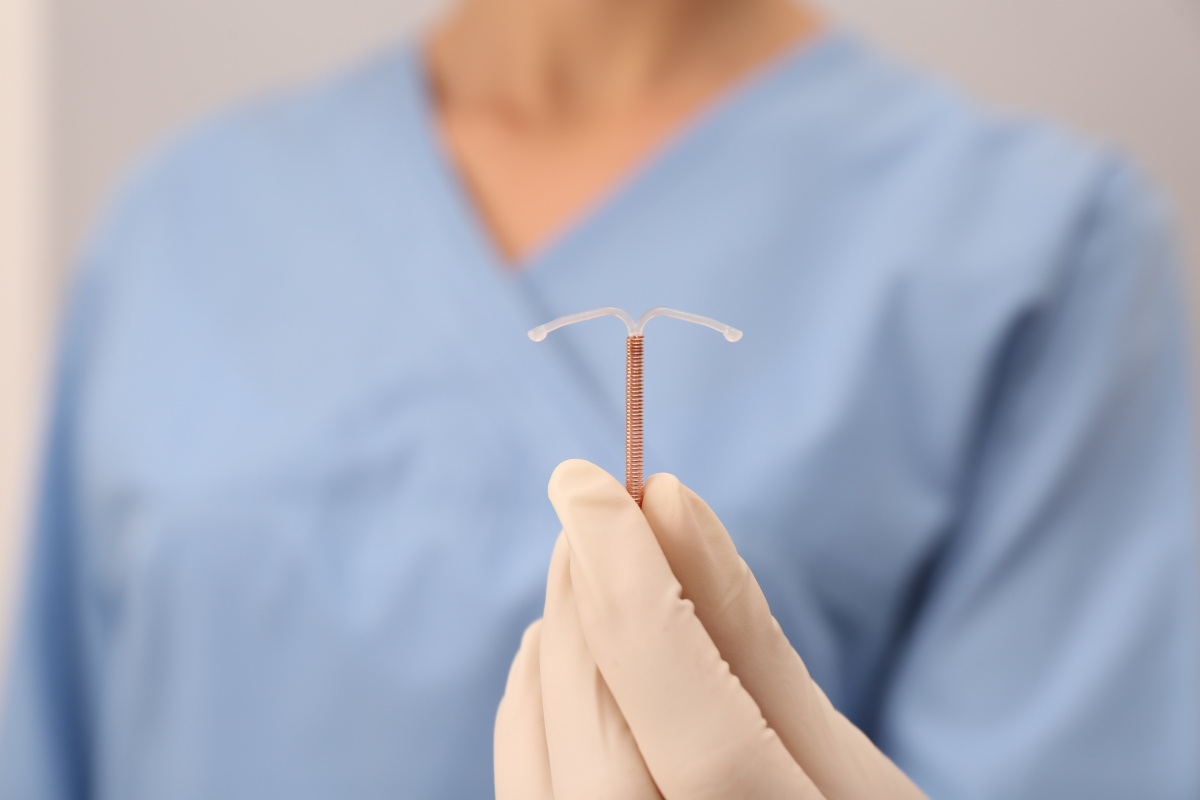Raleigh gynecologist holding IUD