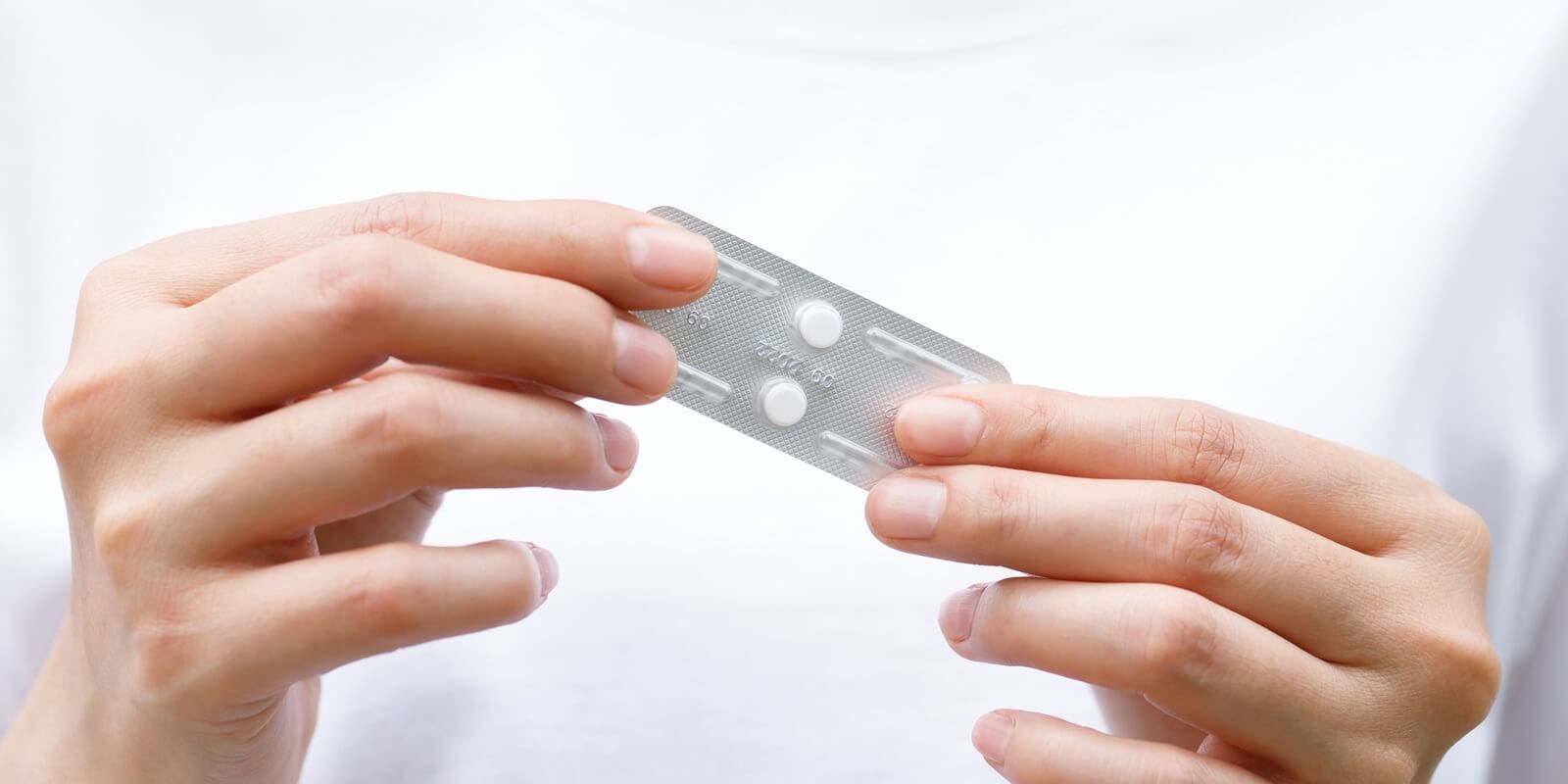 emergency contraception held by woman in Raleigh, NC