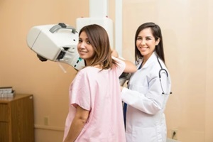 cute patient getting a mammography