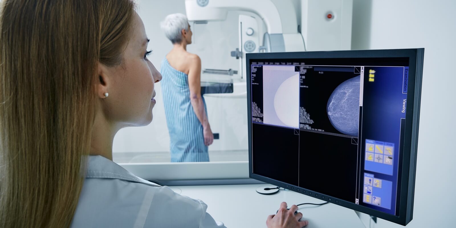 medical technician taking mammogram exam in Raleigh, NC