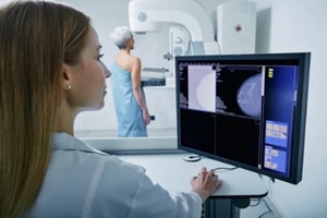 nurse conducting mammogram testing