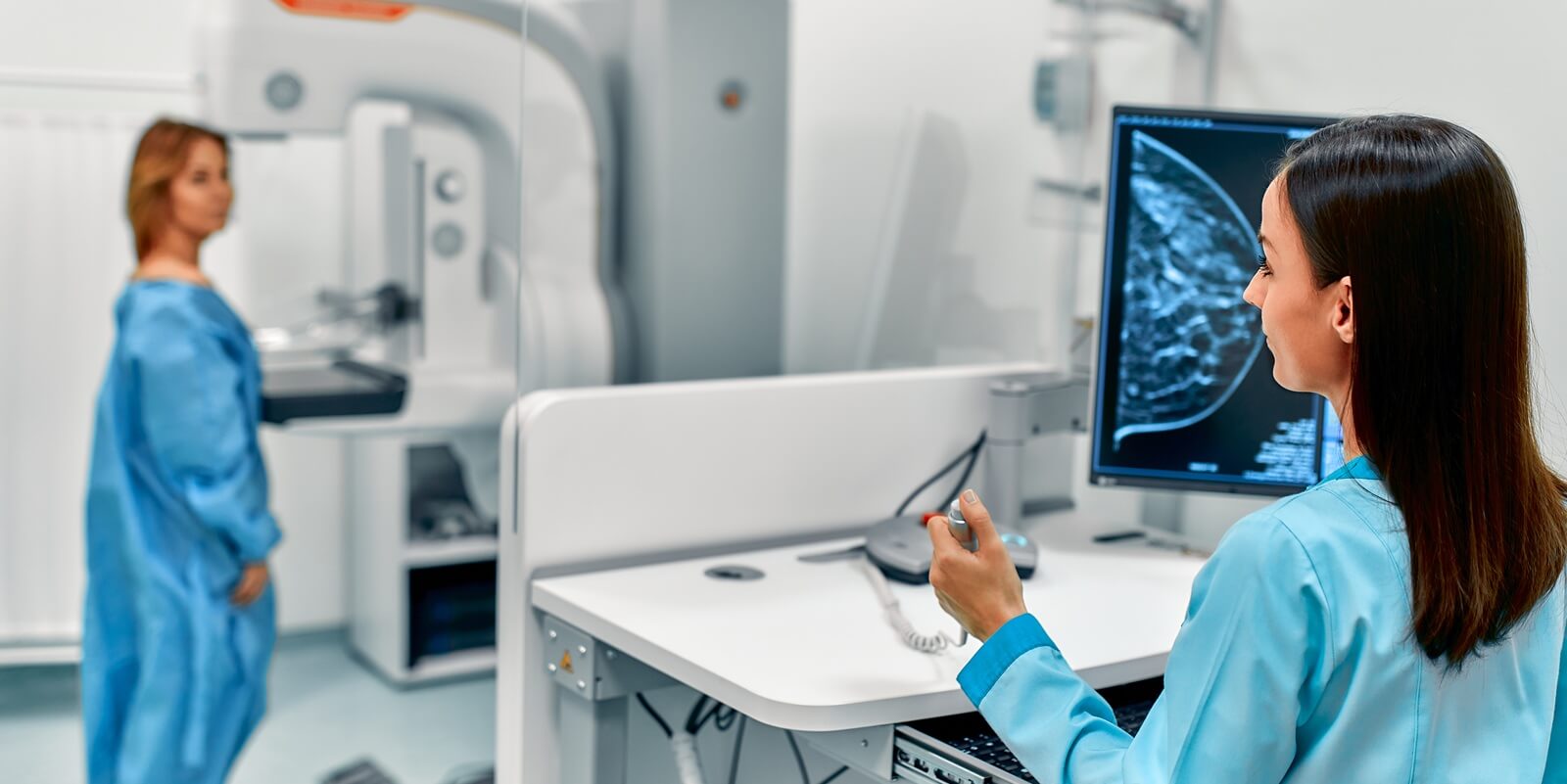 the patient undergoes a screening procedure for breast cancer screening in Raleigh OBGYN