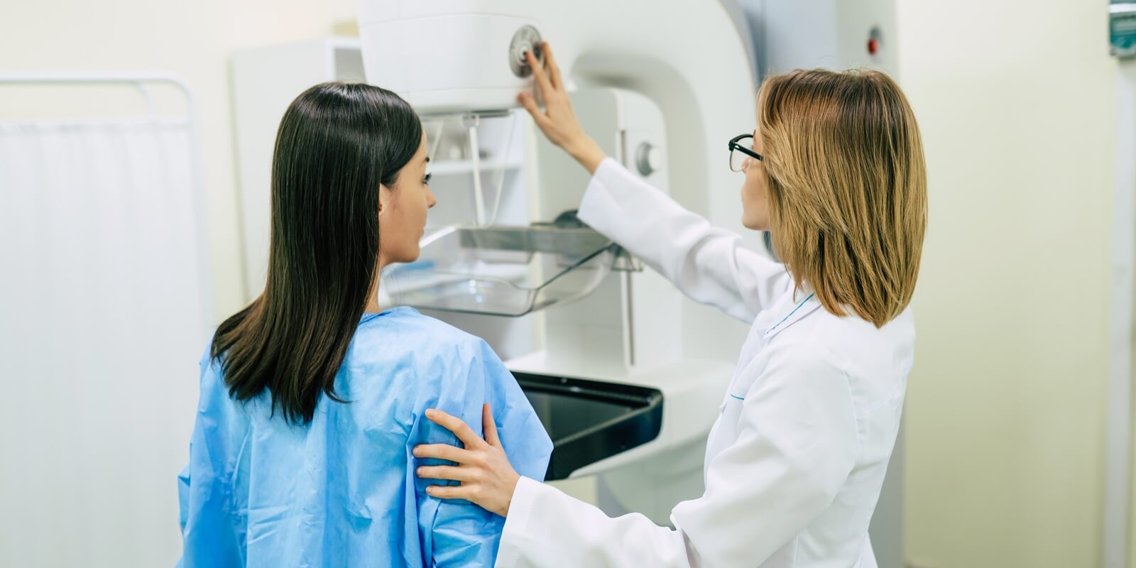 young woman is having mammography examination at Raleigh obgyn