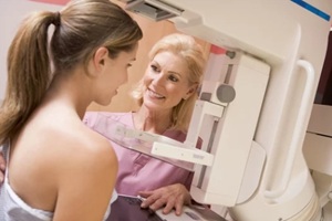 Raleigh, NC RN with patient undergoing mammogram