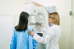 young woman is having mammography examination at the hospital or private clinic with a professional female doctor in Durham, NC