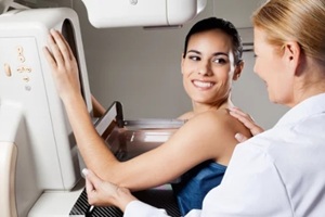 female undergoing mammogram X-ray test