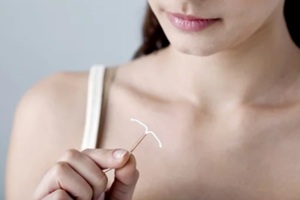 women holding an iud