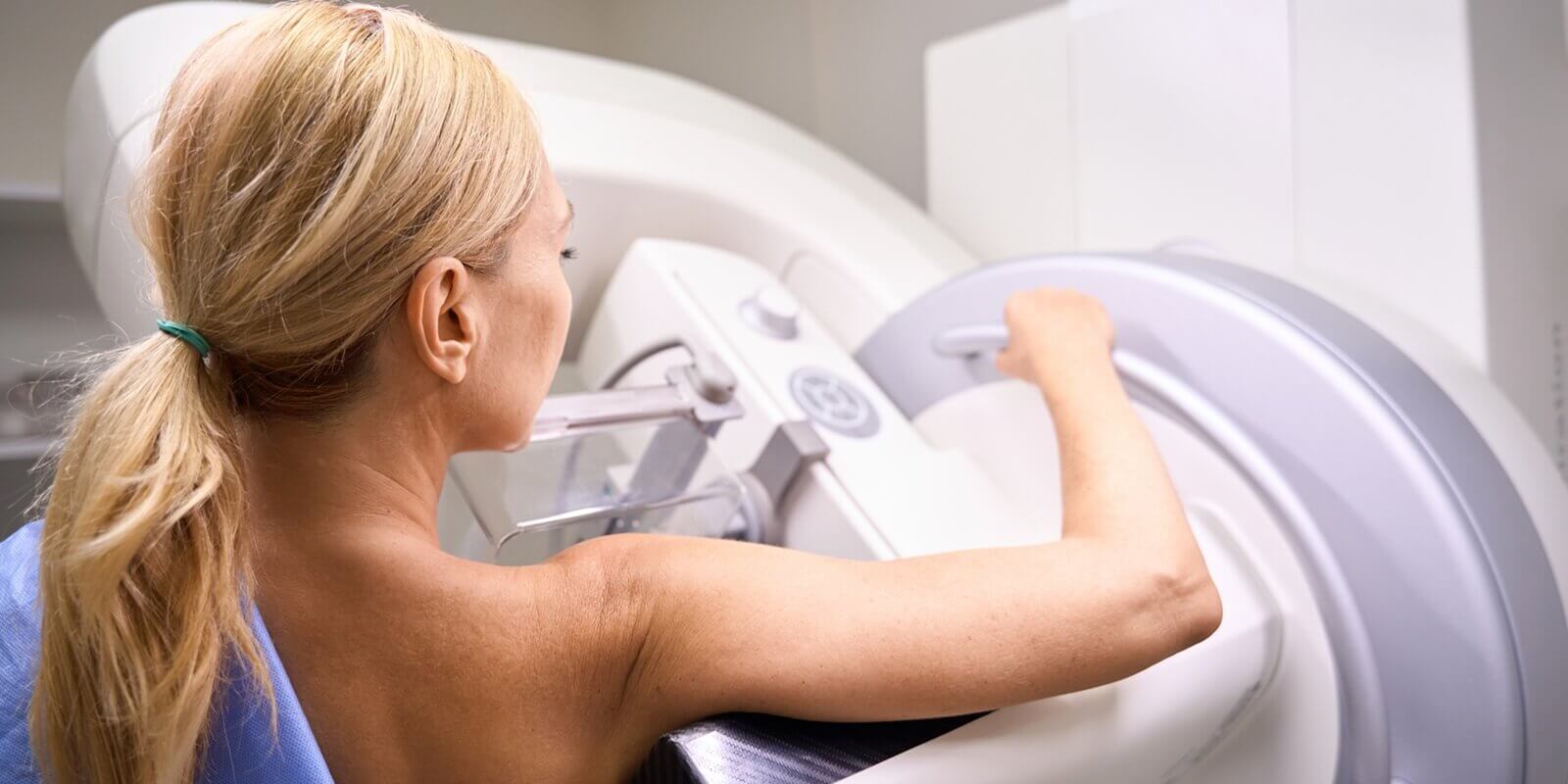 adult female patient receiving 3D mammography in clinic